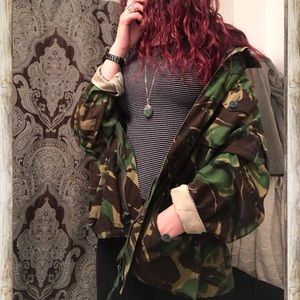 Camouflage jacket with adjustable waist